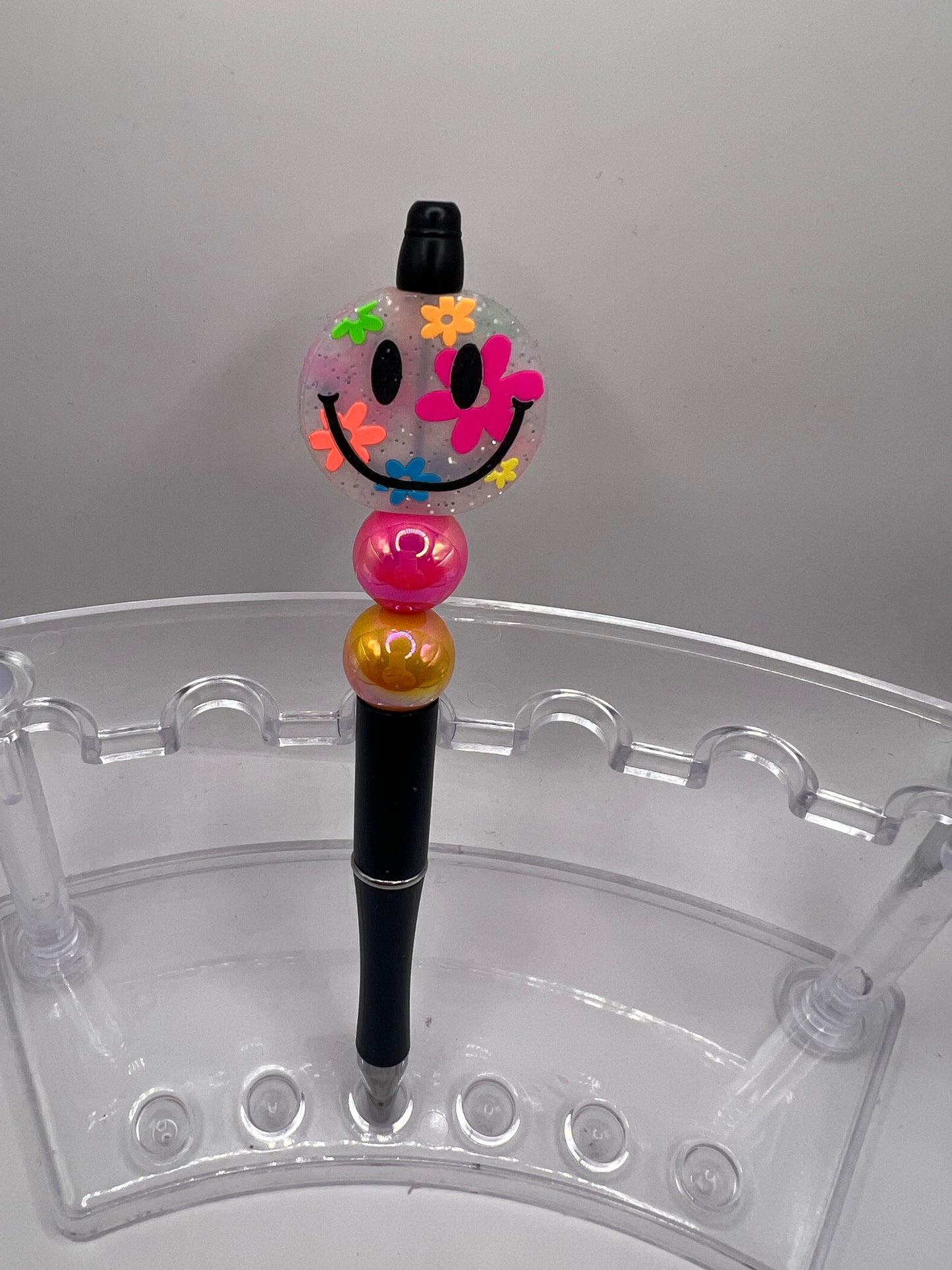Neon smiley face beaded pen