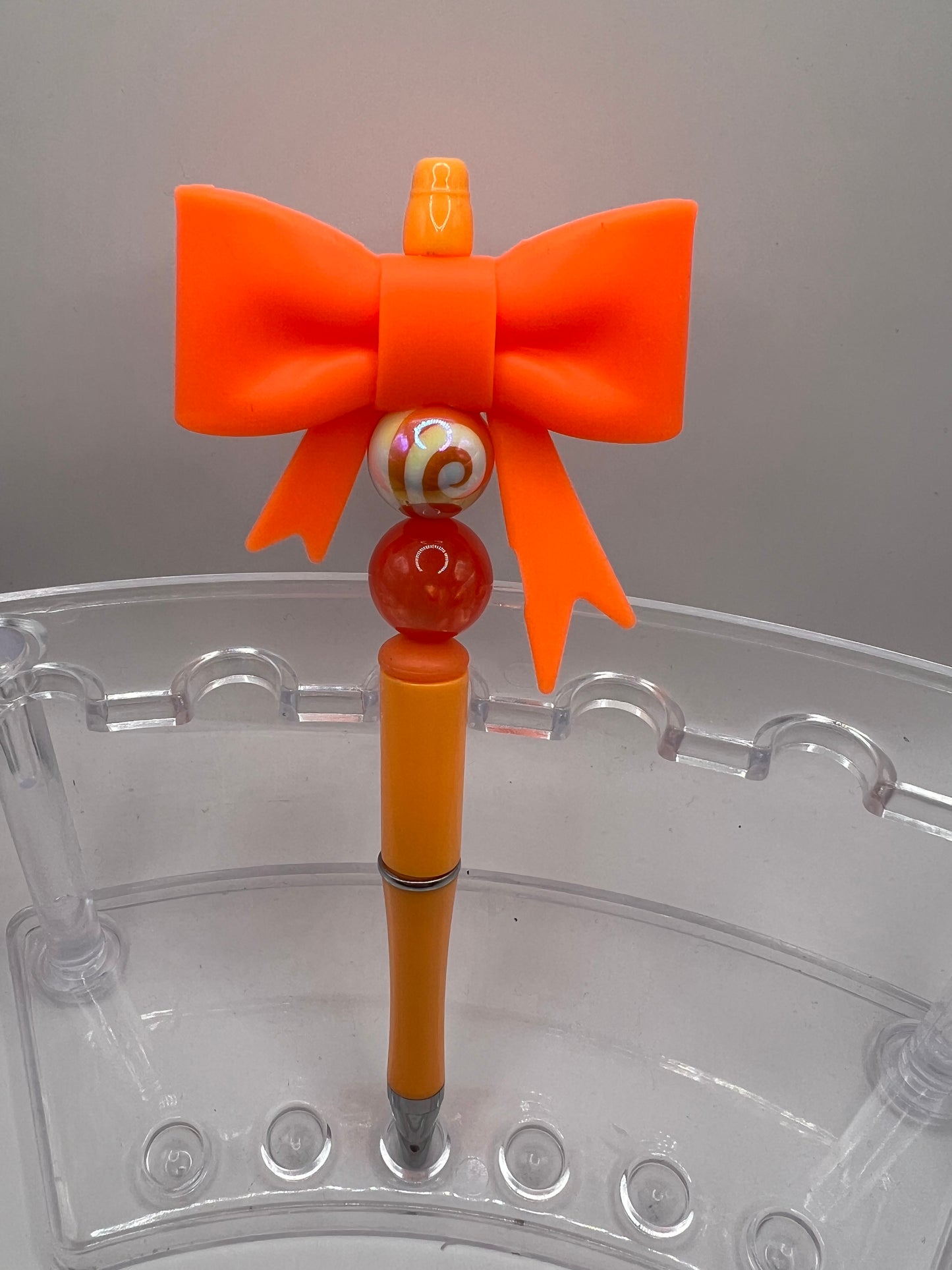 Orange bow beaded pen