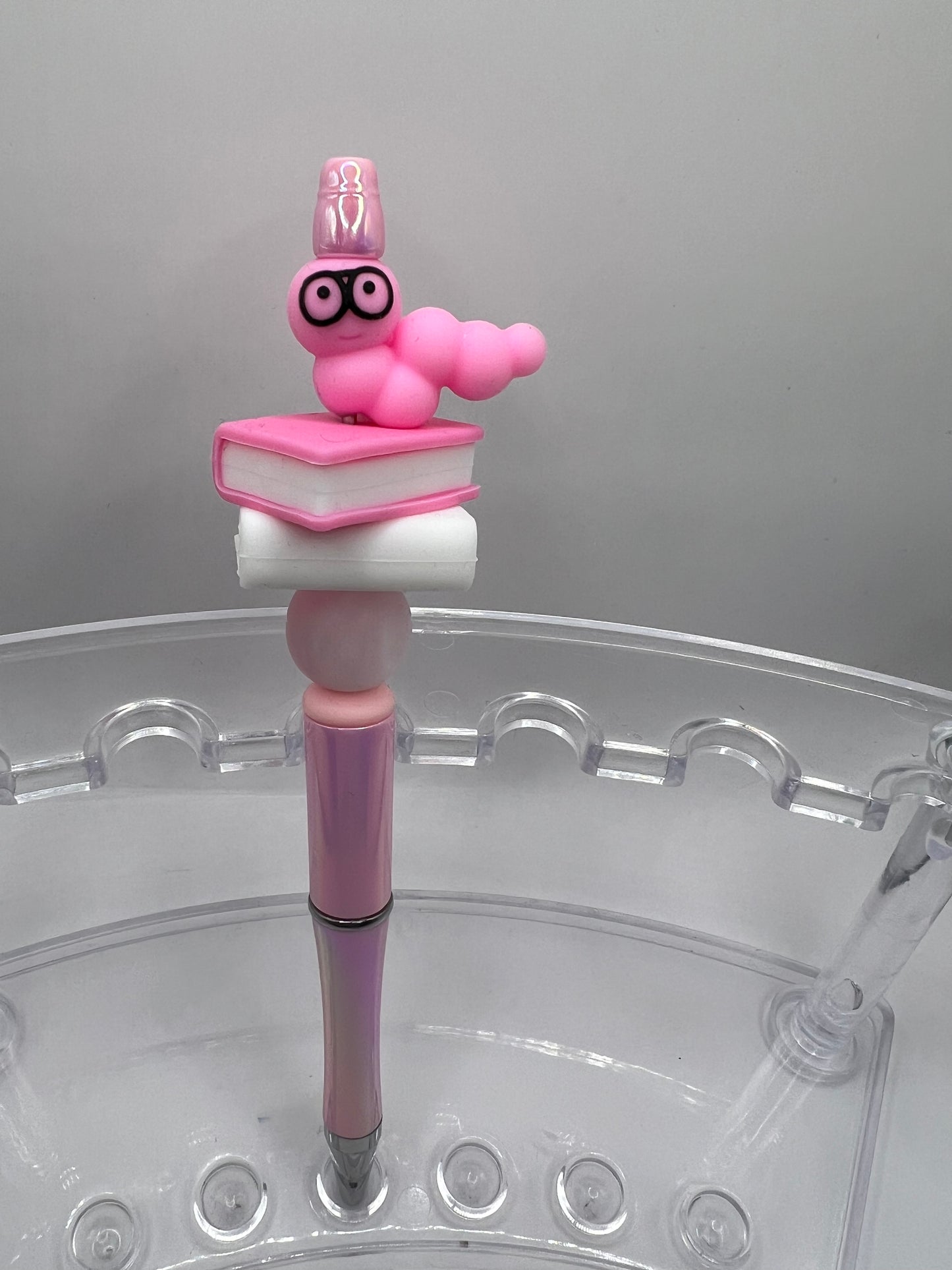 Pink bookworm beaded pen