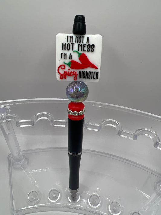 I’m not a hot mess. I am a spicy disaster. Beaded pen.