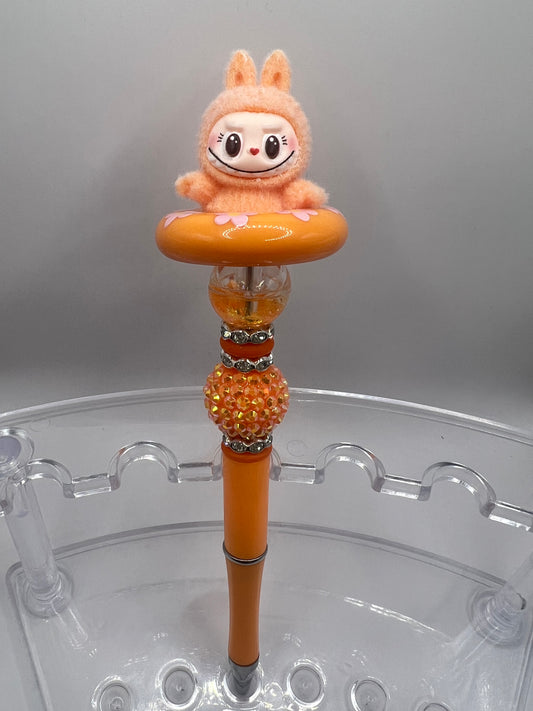 Orange Labubu beaded pen