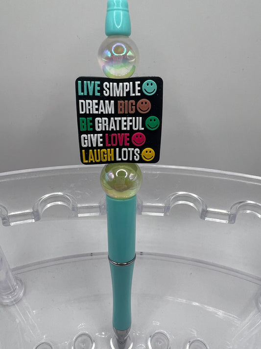 Live simple dream big be grateful give love laugh lots beaded pen