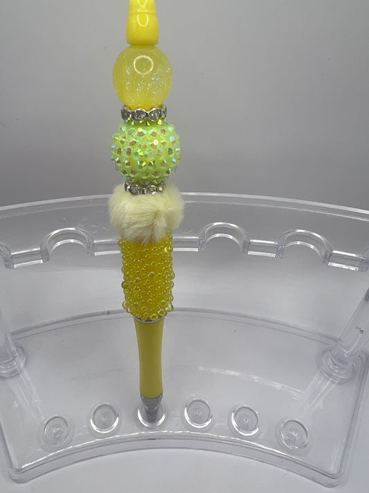 Yellow beaded pen