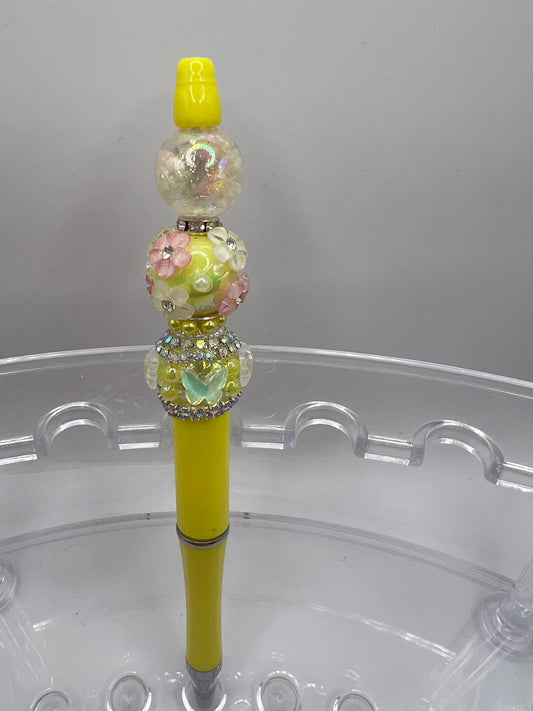 Yellow pen with pink and white flowers and yellow butter butterflies Beaded Pen