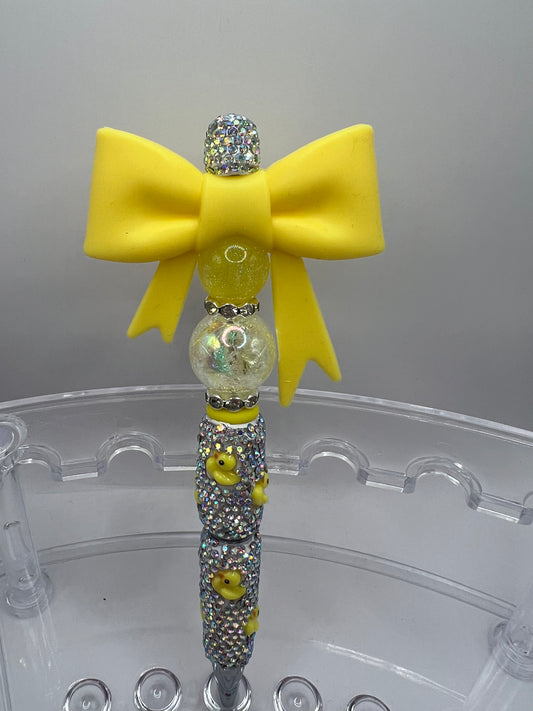 Yellow Bow with sparkling duck pen