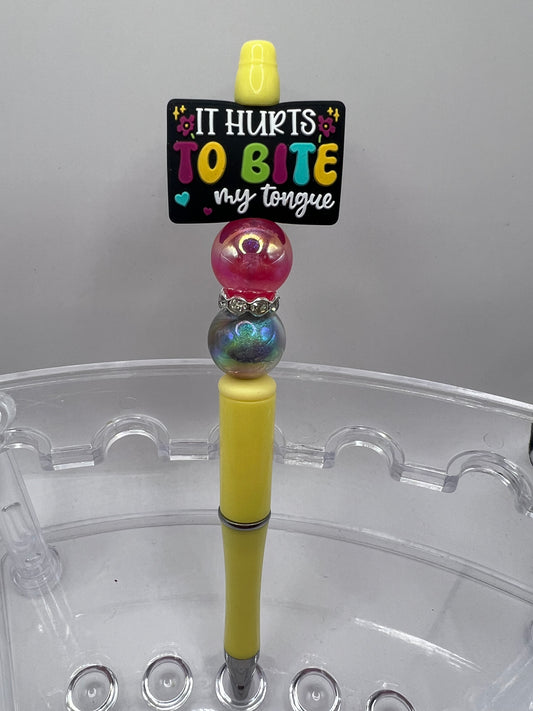 It hurts to bite my tongue beaded pen
