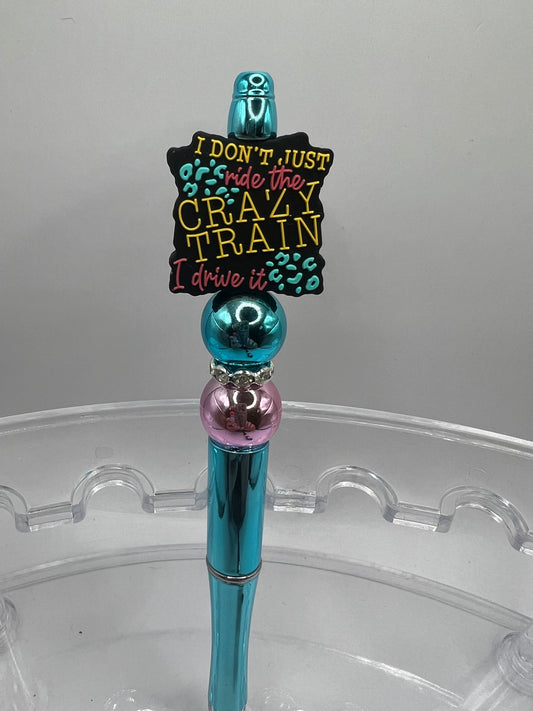 I don’t just ride the crazy train. I drive it beaded pen