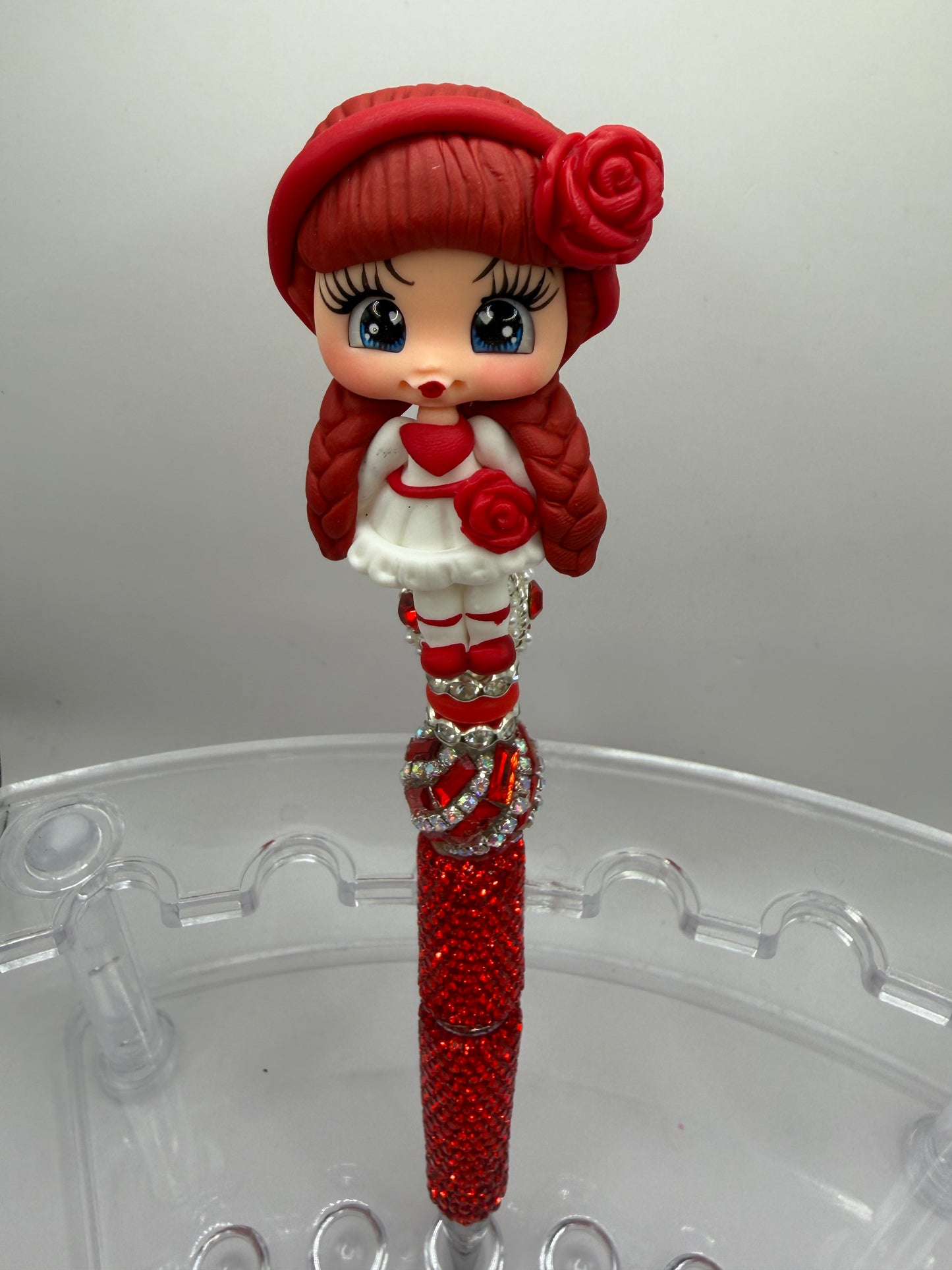 Girl, clay doll