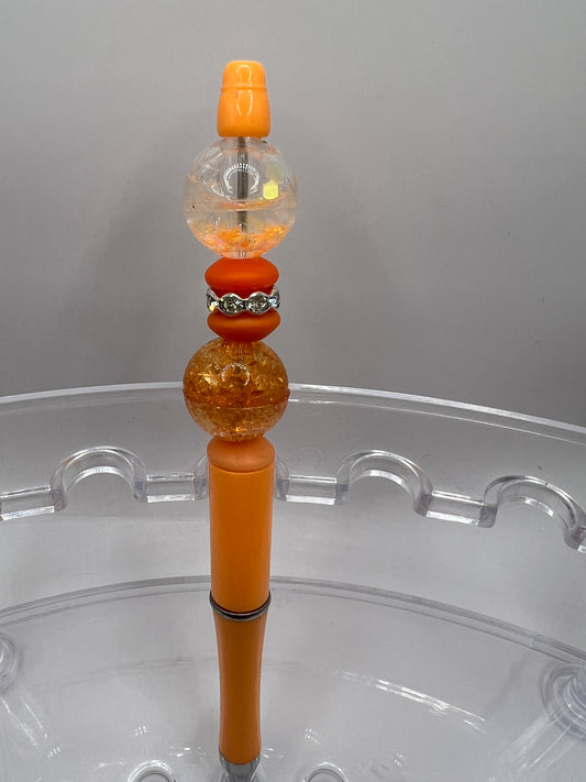Orange beaded pen